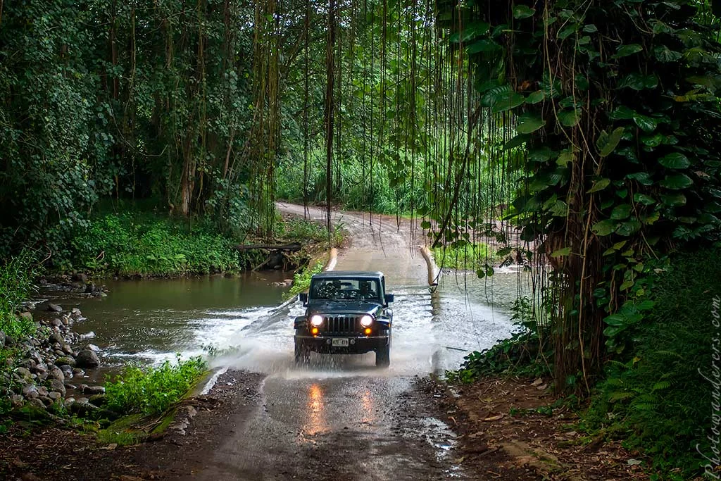 Jeep crossing stream