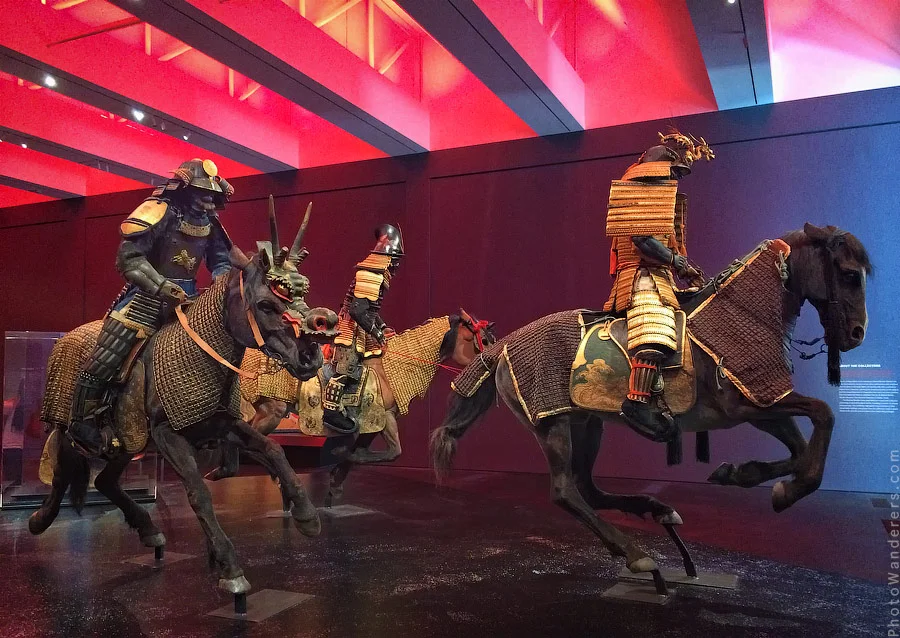 Three mounted warriors, full armor, mid-charge. The room goes quiet when you see them.